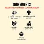 Ingredients label for reduced sodium beef cooking broth featuring grass-fed beef bones, organic mushroom extract, herbs, appl